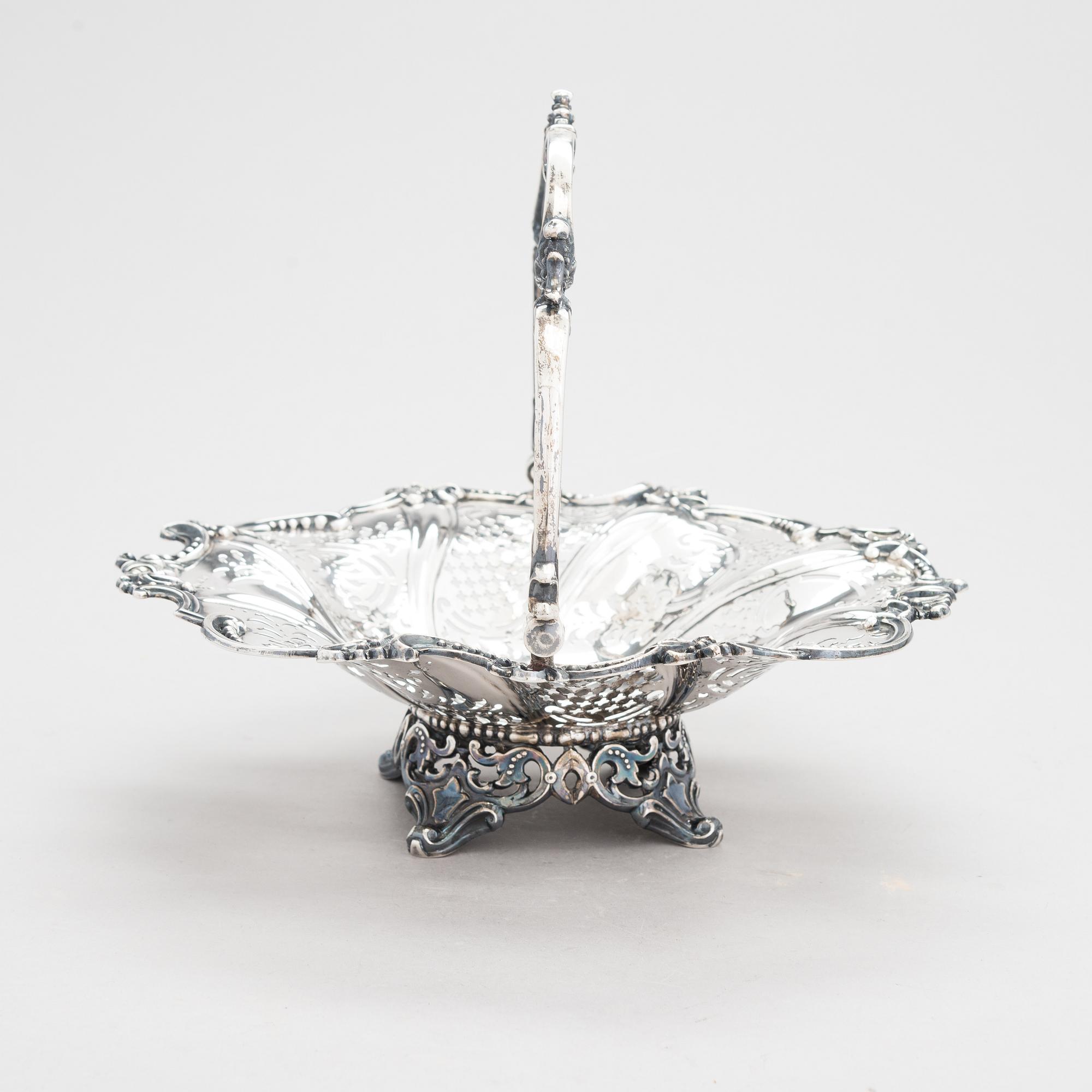 A Victorian sterling silver sweetmeat basket, maker's mark of Henry Wilkinson & Co, Sheffield 1855.