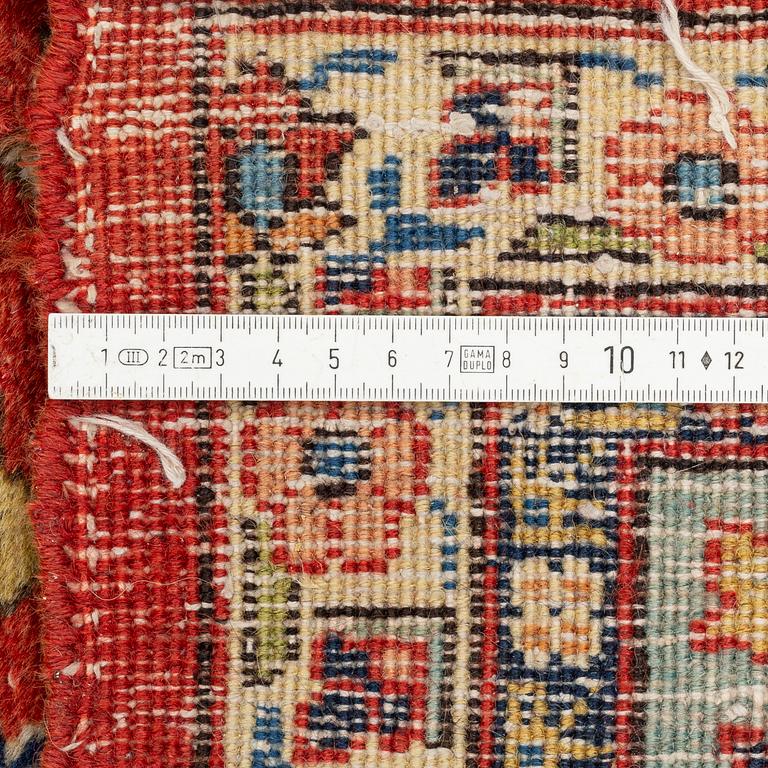 A oriental carpet, ca 320 x 223 cm.
