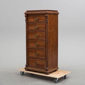 A mahogany chest of drawers, circa 1900.