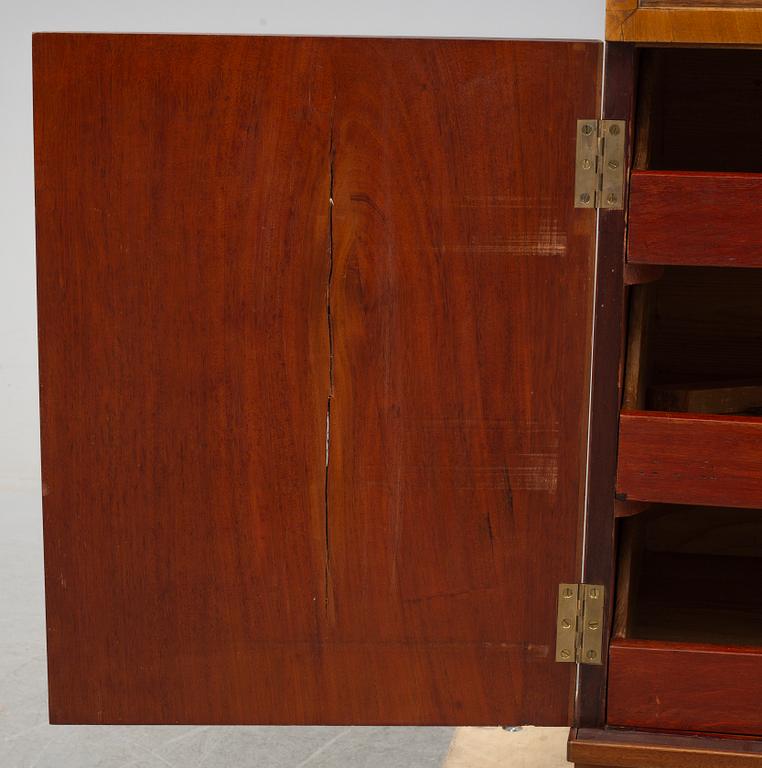 A northern european empire chiffonier, first half of the 19th century.