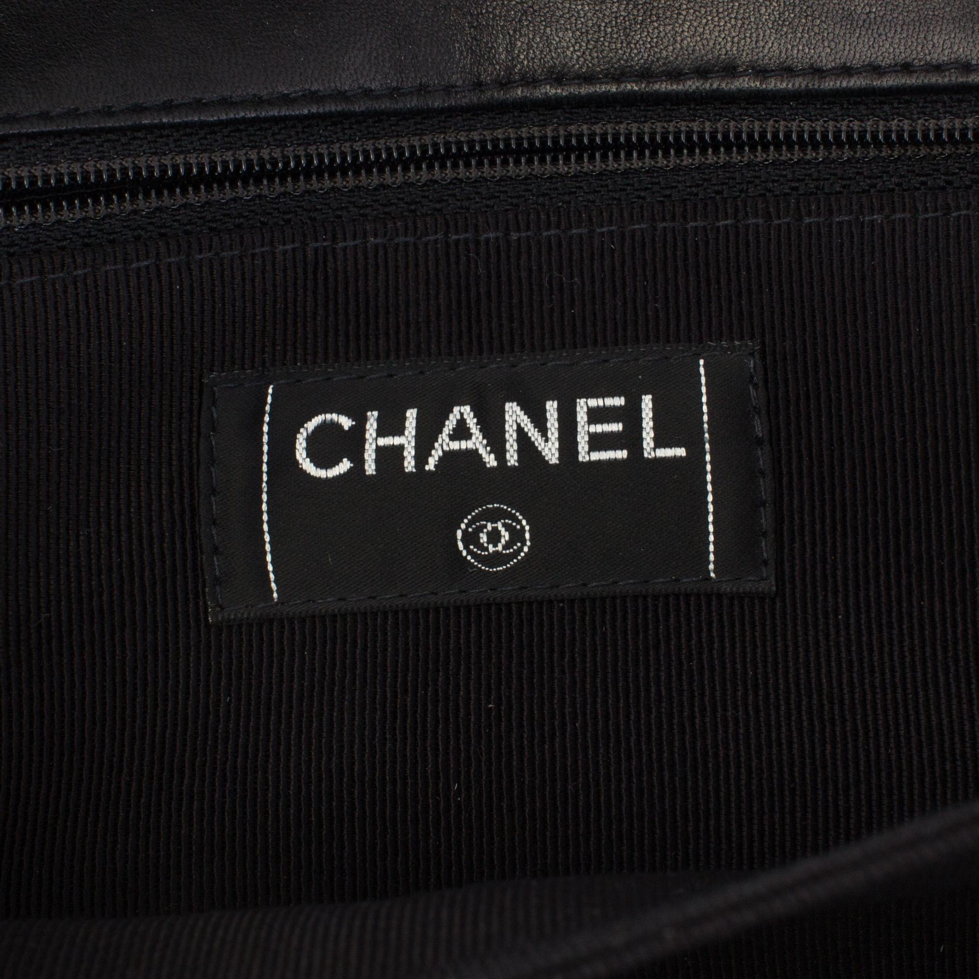 A bag CHOCOLATE BAR REISSUE by Chanel.