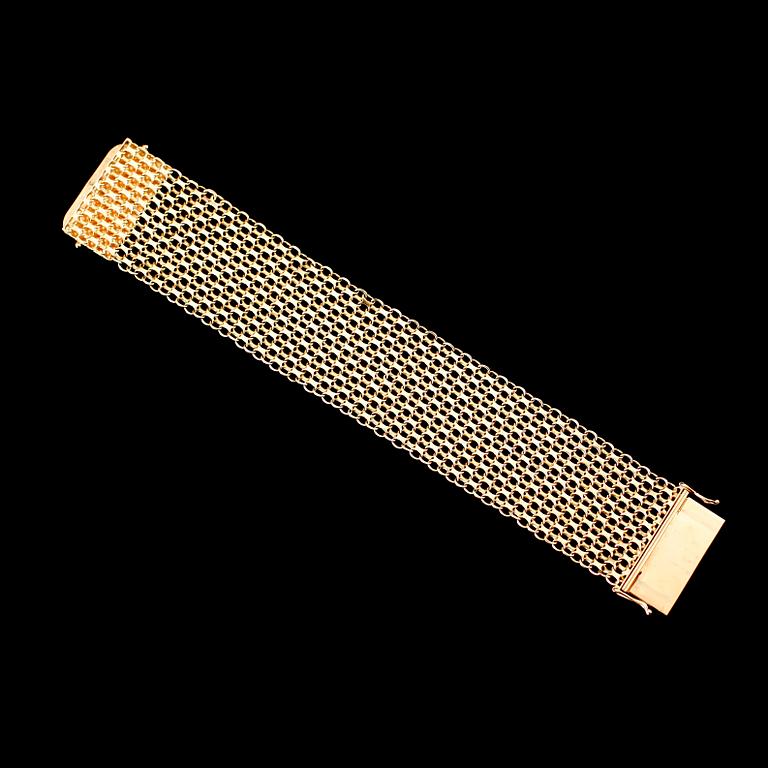 ARMBAND, 18 k guld, Äsa, 1970. Vikt ca 39 gram.