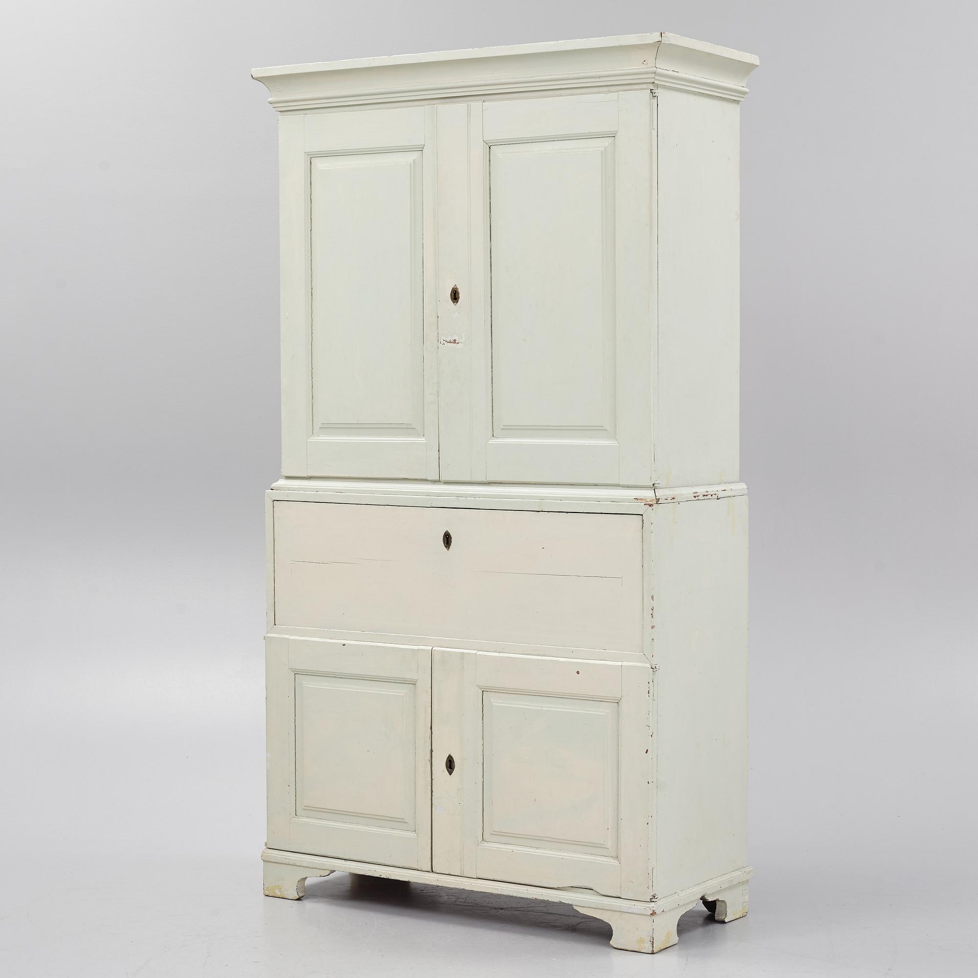 A 18th century panited cabinet.