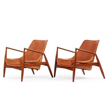 Ib Kofod Larsen, a pair of teak and cognac coloured leather "Sälen" easy chairs, Olof Perssons Fåtöljindustri (OPE), Sweden, 1950-60's.