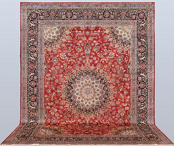 A Kashmar carpet, approx. 387 x 297 cm.