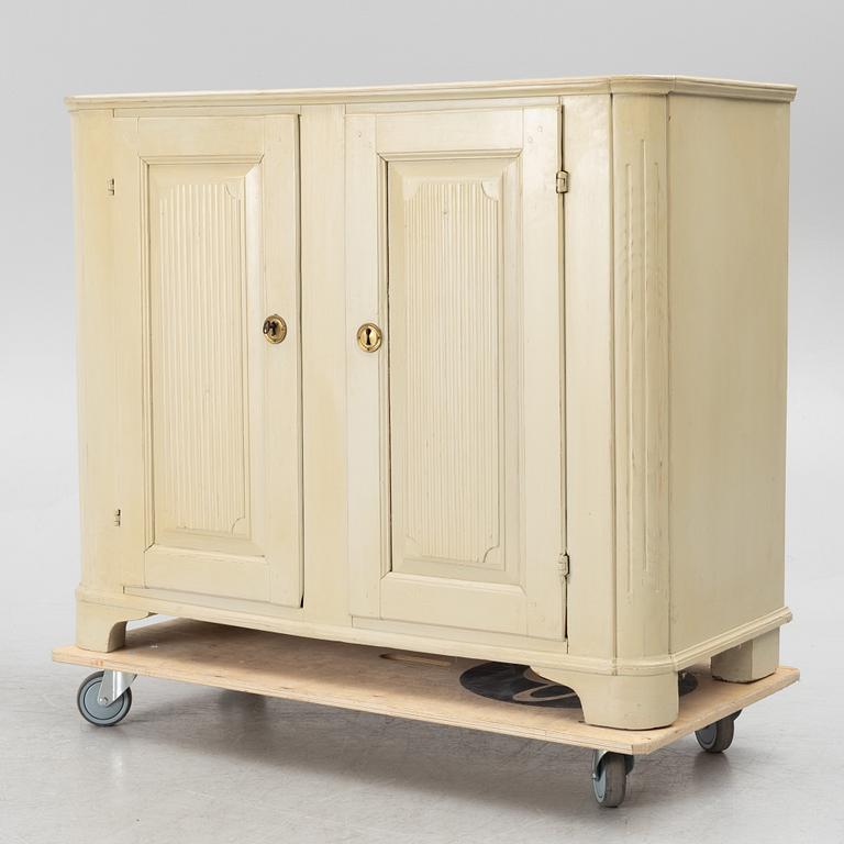 A Gustavian cupboard, early 19th century.