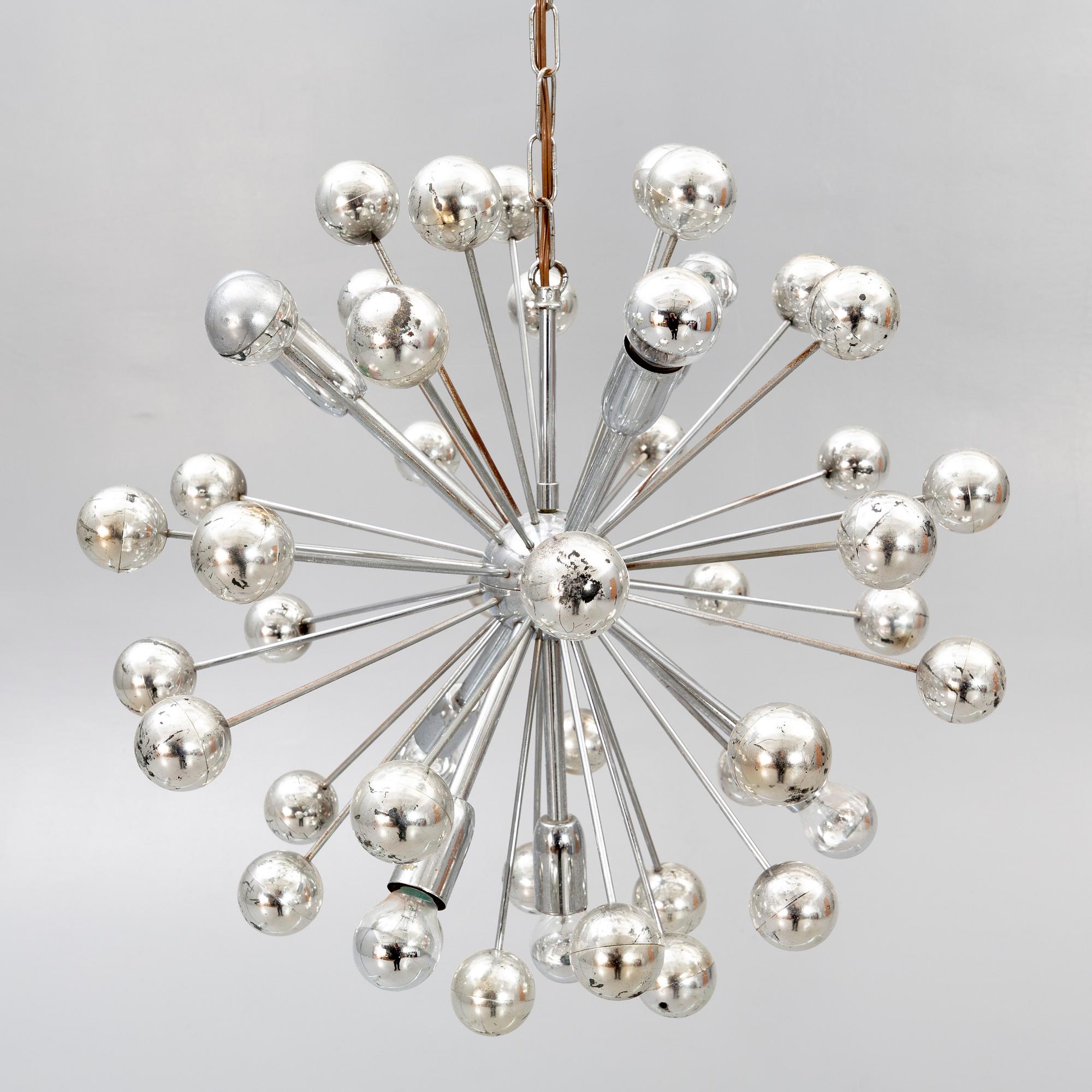 A Paul de Haan ceiling pendant alter part of the 20th century.