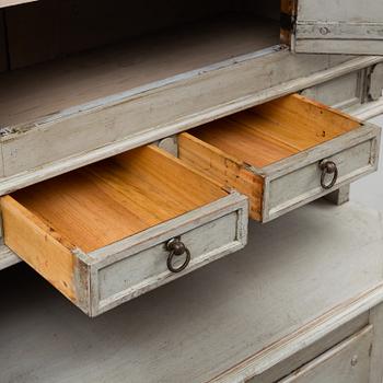 A 19th Century Baroque style cupboard.
