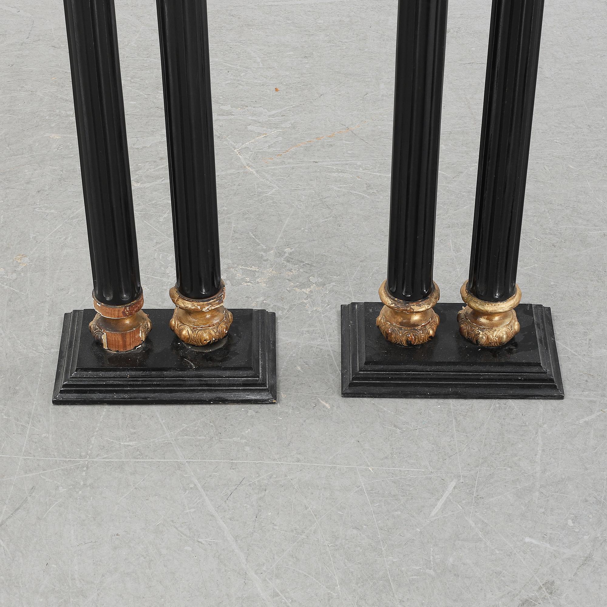 A pair of columns, first half of the 20th century.