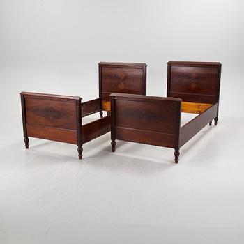 A pair of  mahognay veneered headboards from around year 1900.