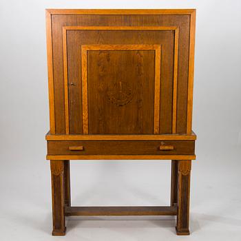 A 1920's oak cabinet.