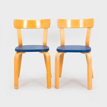 Alvar Aalto, two model 69 chairs, O.Y. Huonekalu- ja Rakennustyötehdas A.B, 1957.
