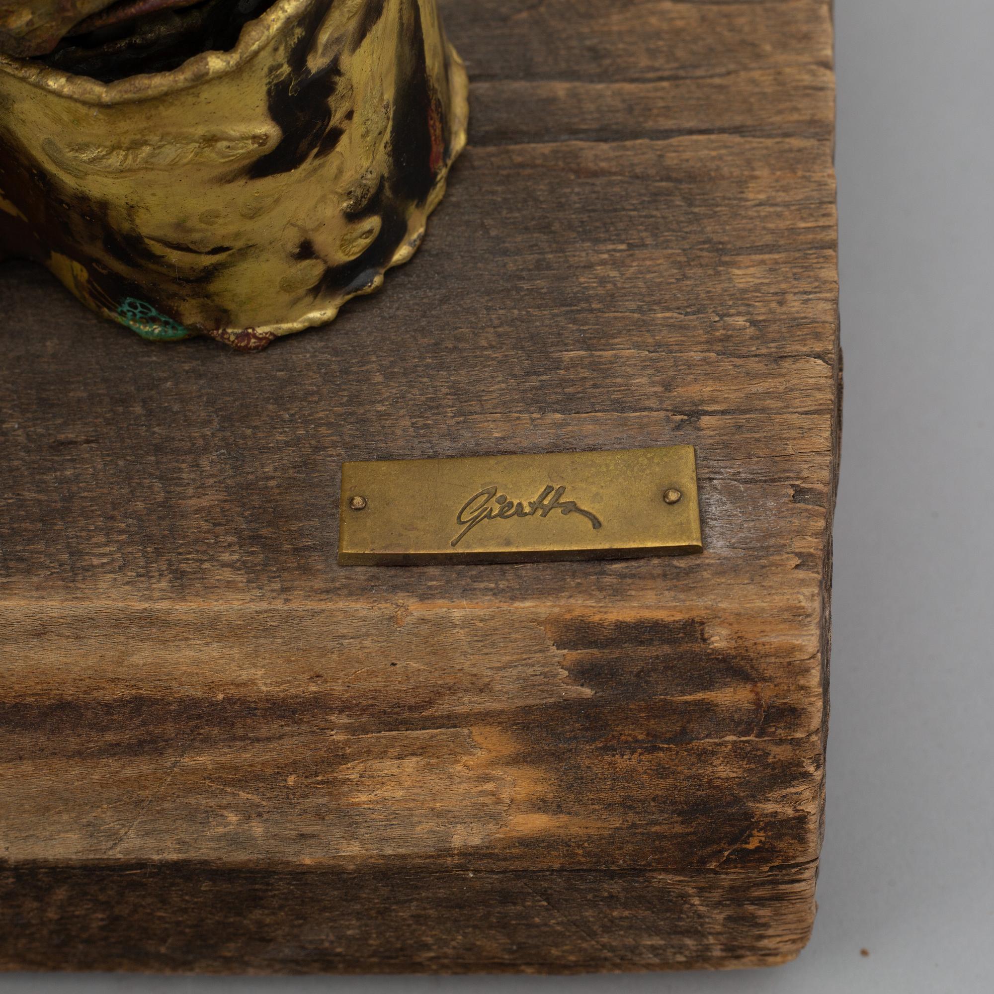 A signed sculpture by Claes E. Giertta.