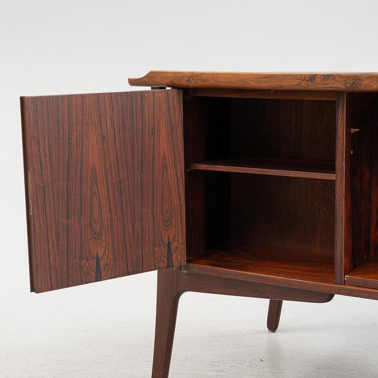 A rosewood-veneered desk, HP Hansen, Denmark, 1950's/60's.