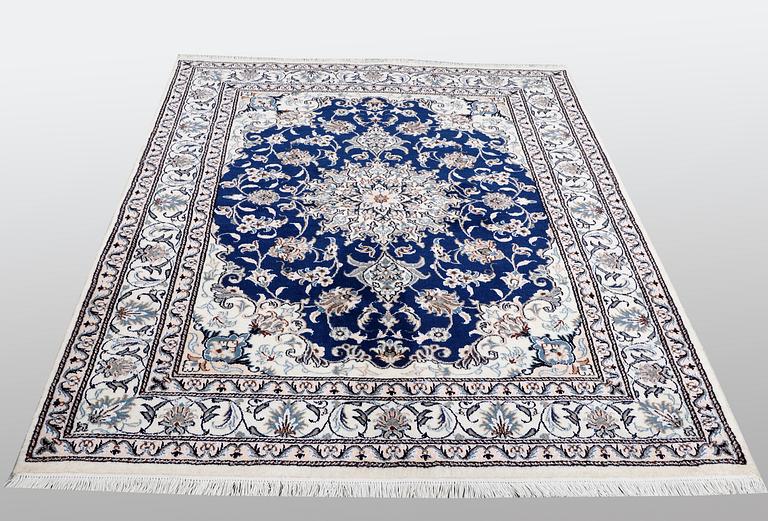 A carpet, Nain, part silk, ca 205 x  152 cm.