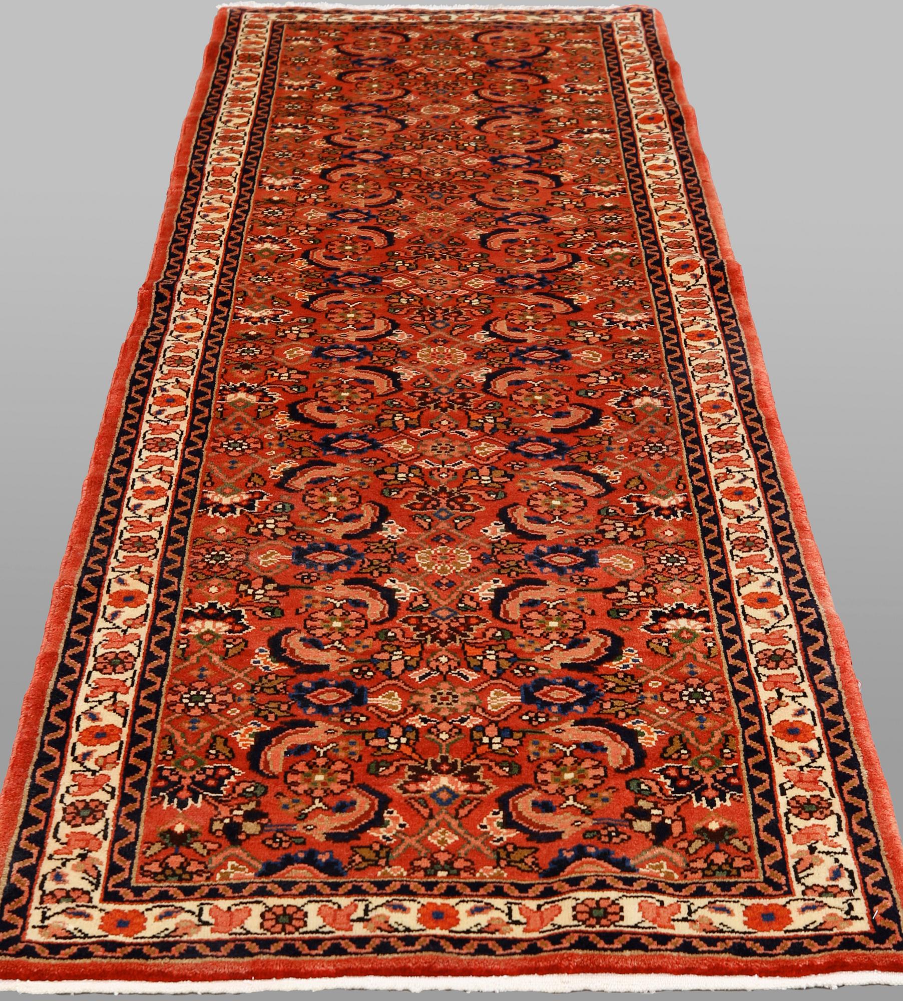 A Hosseinabad runner, approx. 286 x 98 cm.