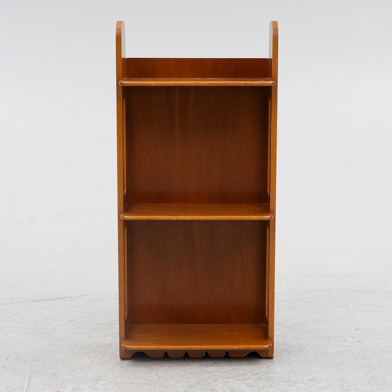 Josef Frank, a model 2085 wall shelf for Firma Svenskt Tenn.