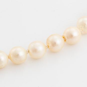 Cultured pearl necklace, with heart shaped charm.