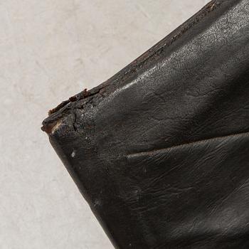 A pair of Poul Kjaerholm metal and leather PK22 easy chairs from Kold Christensen Denmark.