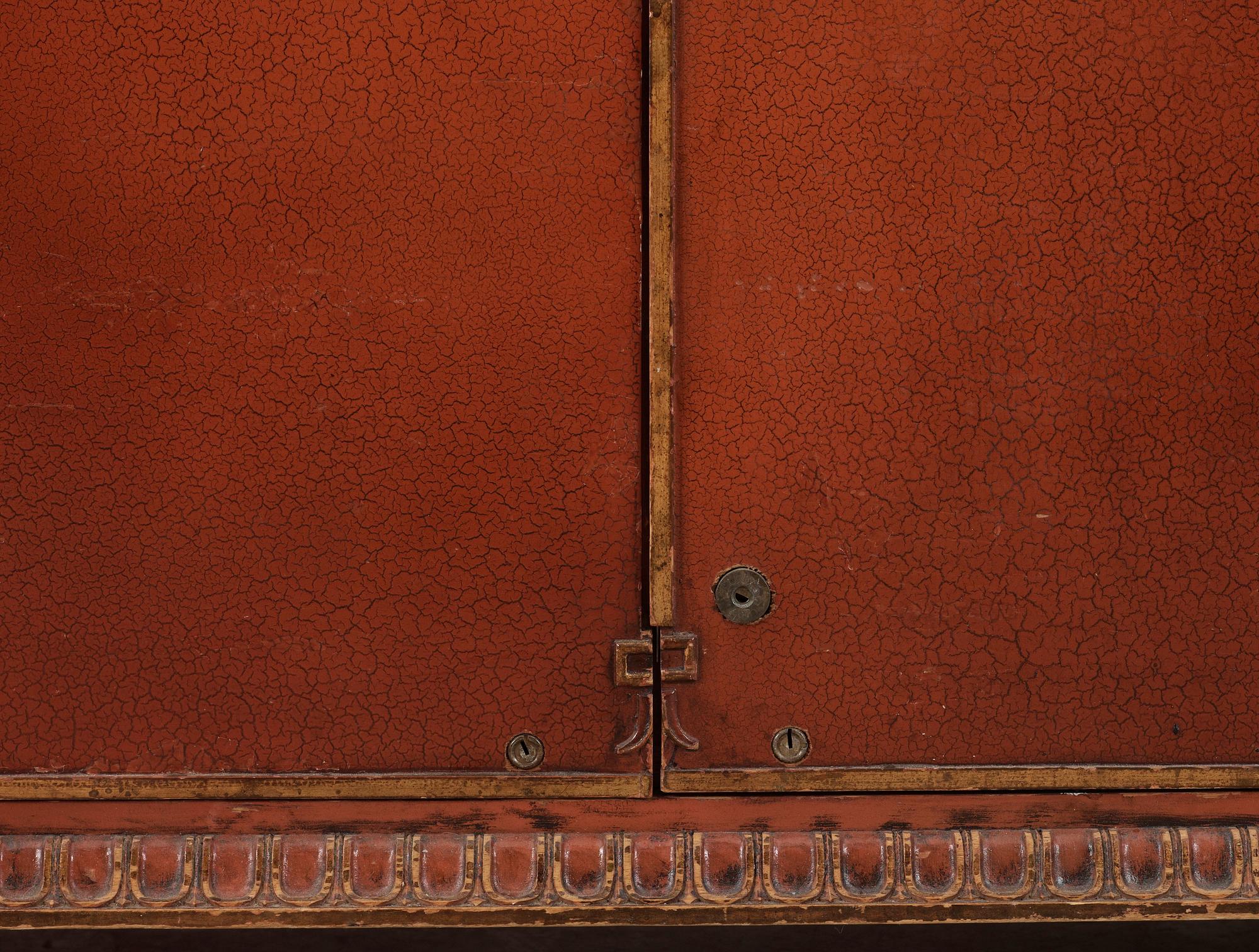 An Axel Einar Hjorth red lacquered wardrobe, 'Åbo', Nordiska Kompaniet 1929.