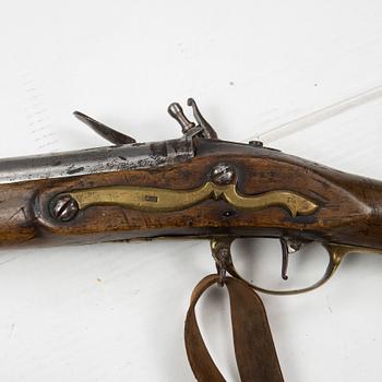 A British mid 18th Century flintlock musket.