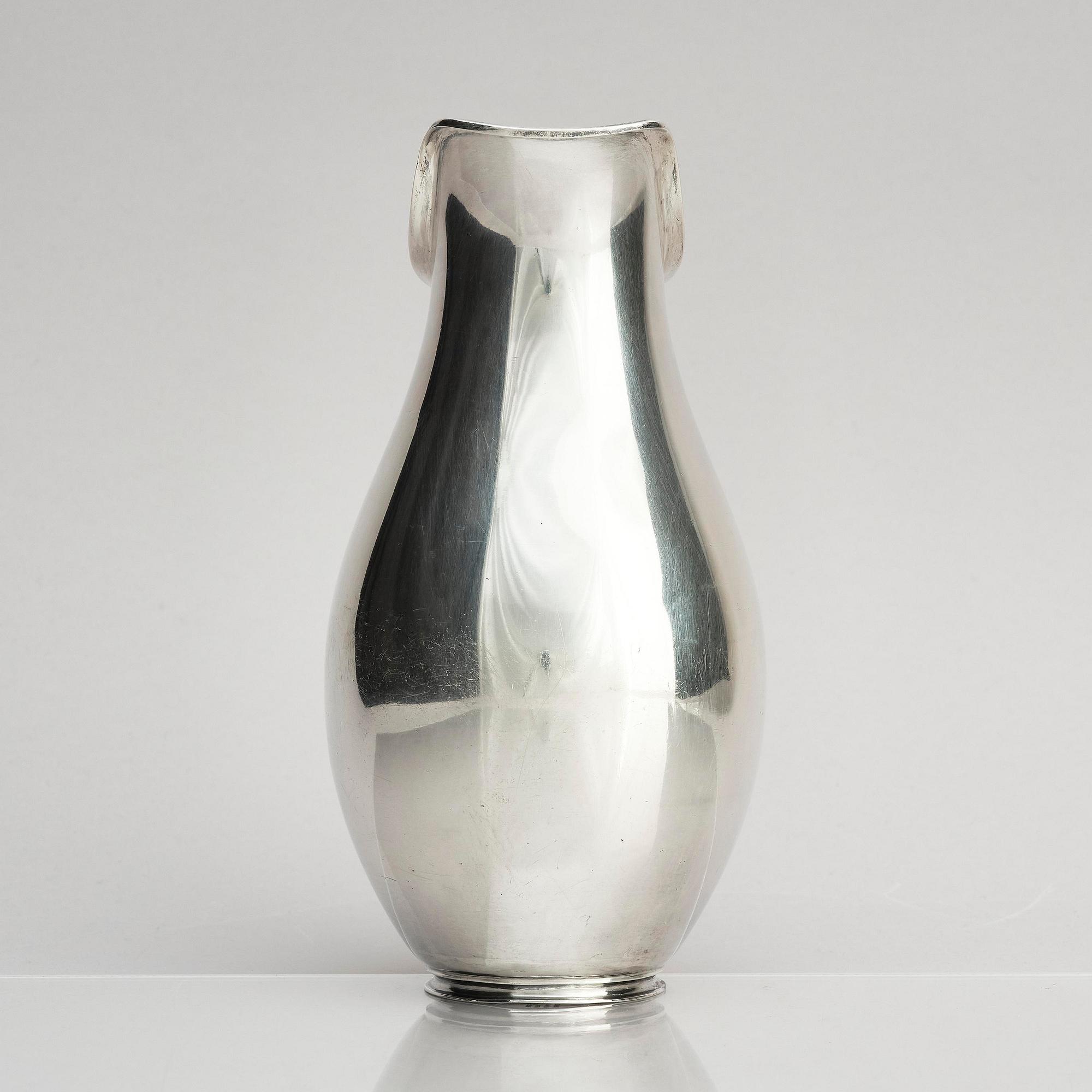Anton F. Rasmussen, a silver water pitcher with bakelite handle, Aarhus, Denmark, cirka 1950s.