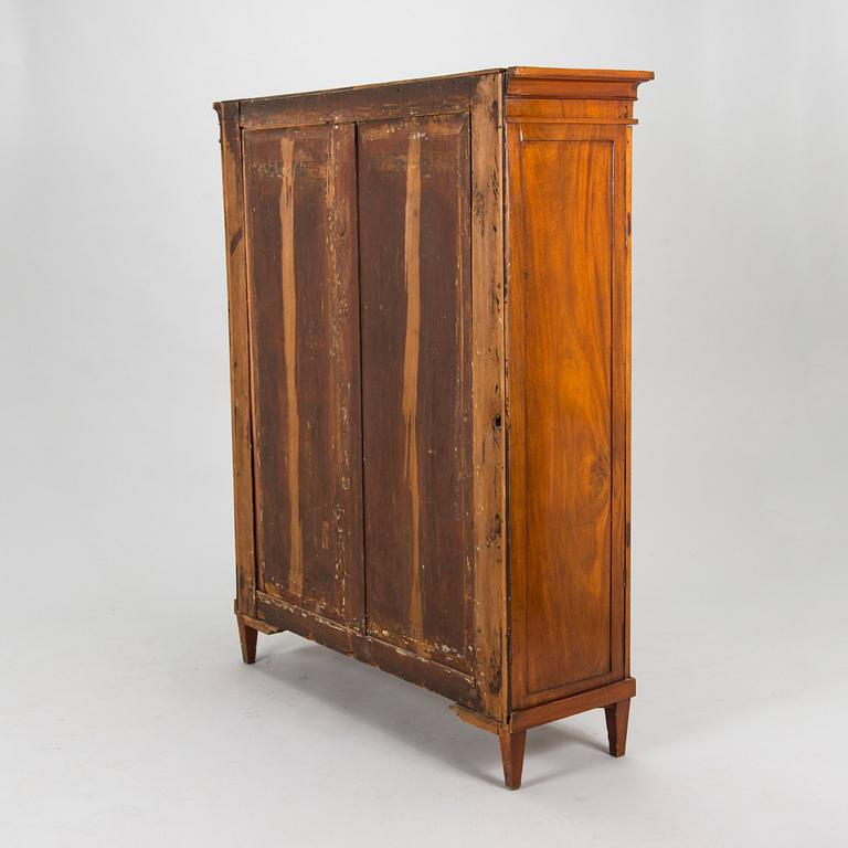 An Empire cabinet, circa 1810.