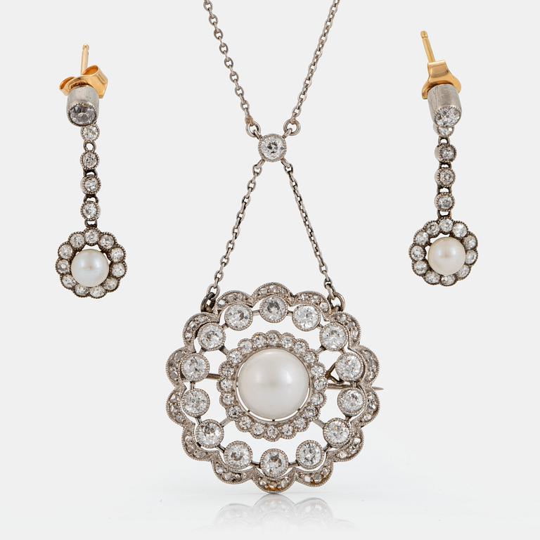 A necklace/brooch and a pair of earrings in platinum and gold set with pearls and old- and rose-cut diamonds.