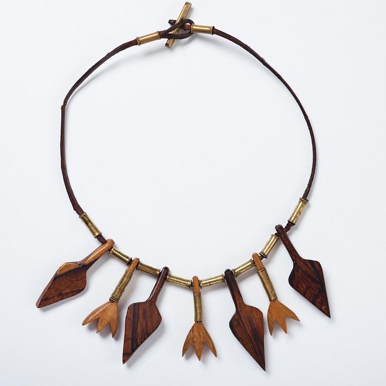 Vivianna Torun Bülow-Hübe, a leather necklace with brass and carved wooden details, Stockholm ca 1948.