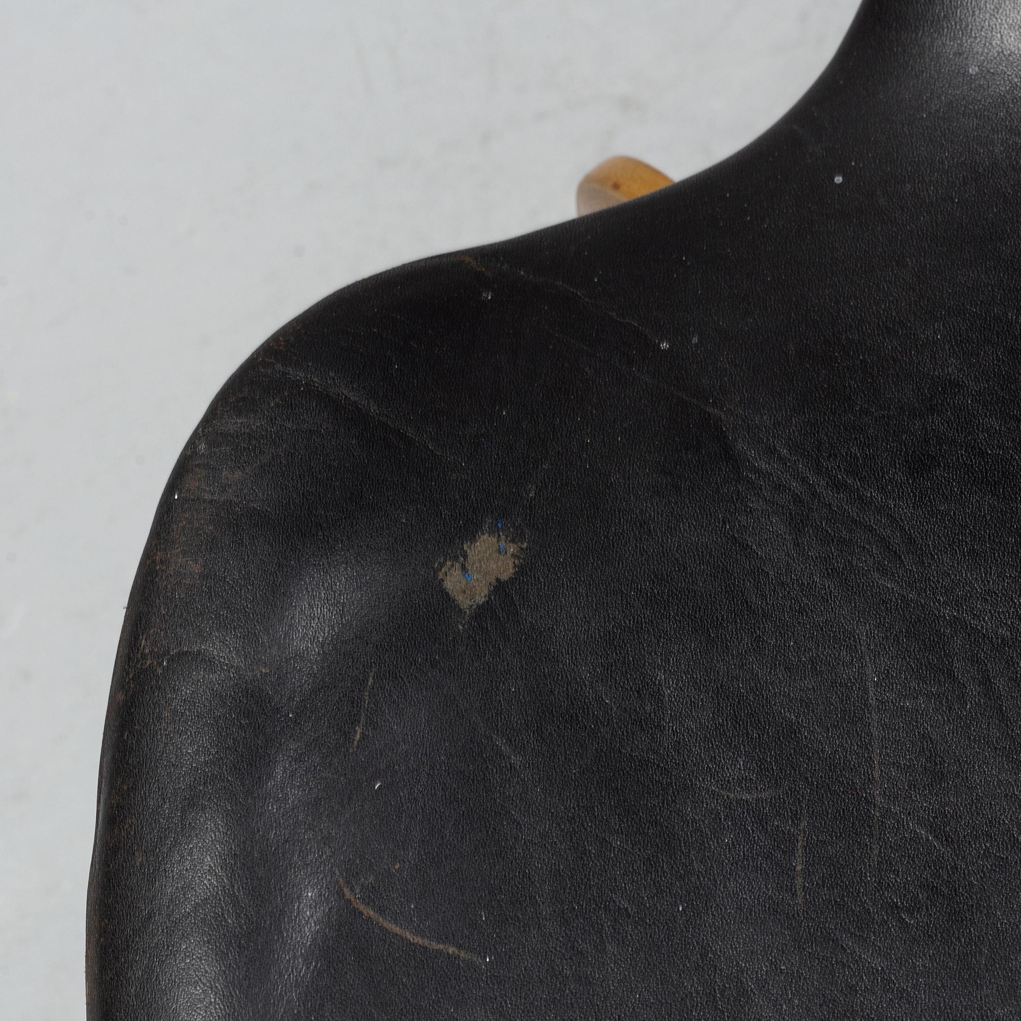 A 'Grand Prix' chair by Arne Jacobsen for Fritz Hansen, designed 1957.