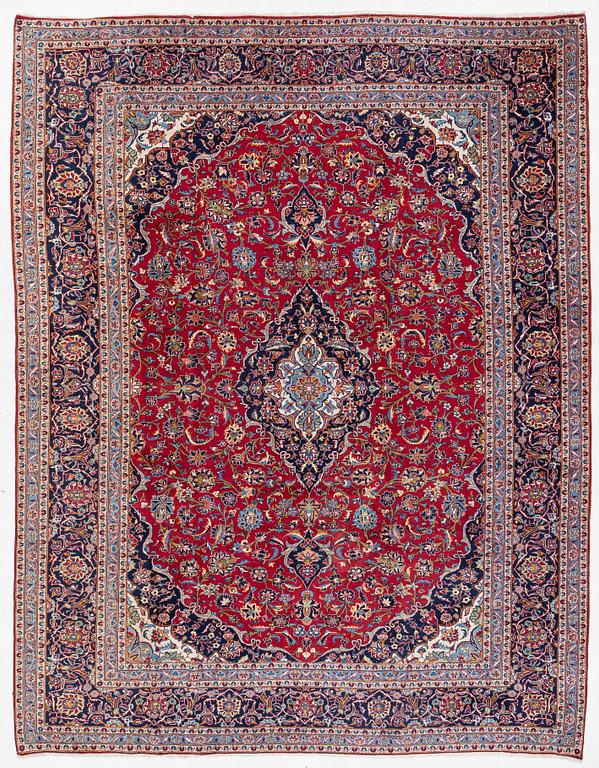 A Keshan carpet, c. 384 x 300 cm.