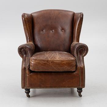An armchair, contemporary.