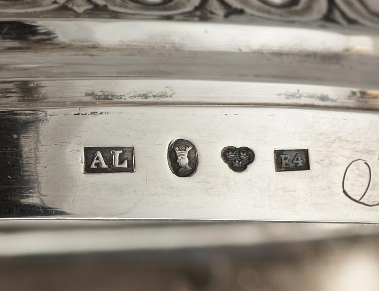 Two pairs of Swedish 19th century silver candlesticks, makers mark of Anders Lundqvist, Stockholm 1834 and 1836.