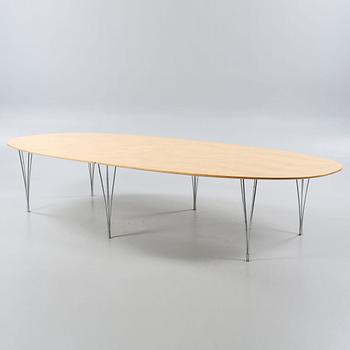 A conference table named "Superellips", designed by Bruno Mathsson and Piet Hein for Fritz Hansen.