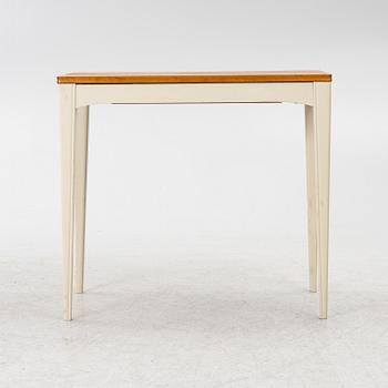 A dining table, mid-20th century.