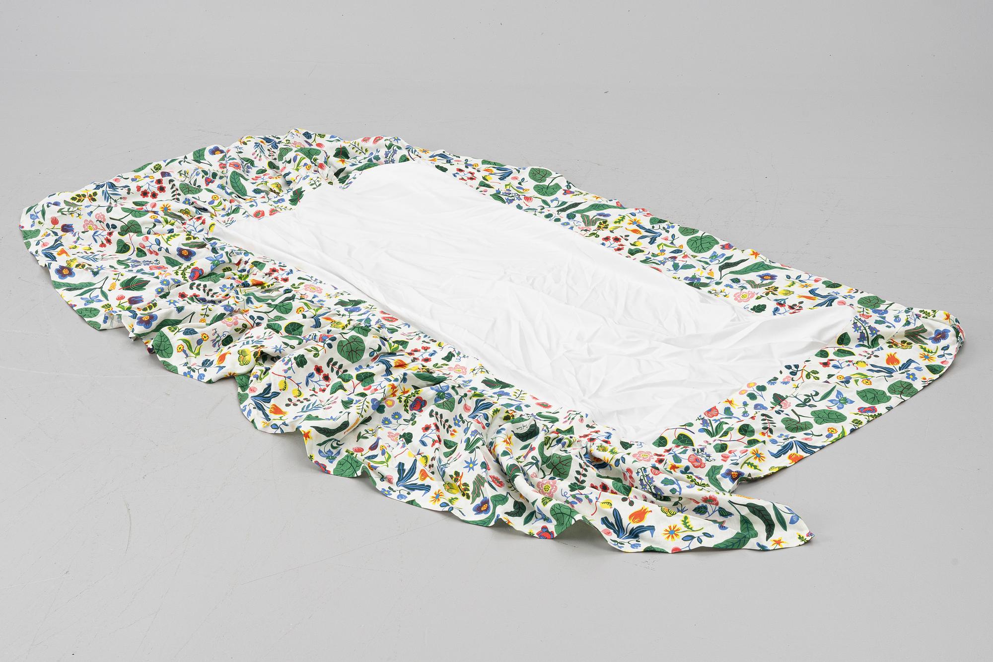 Headboard, upholstered in fabric from Svenskt Tenn.