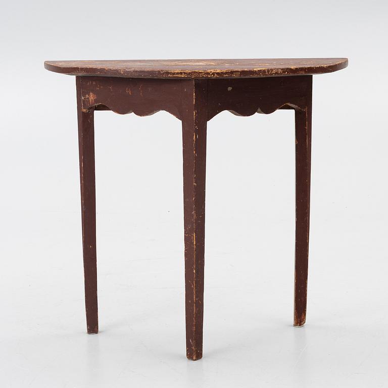 A 'half-moon table', 19th century.