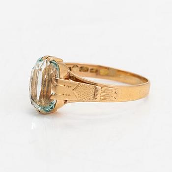 Ring, 18K guld med en akvamarin, Oskar Lindroos, Helsingfors 1917.