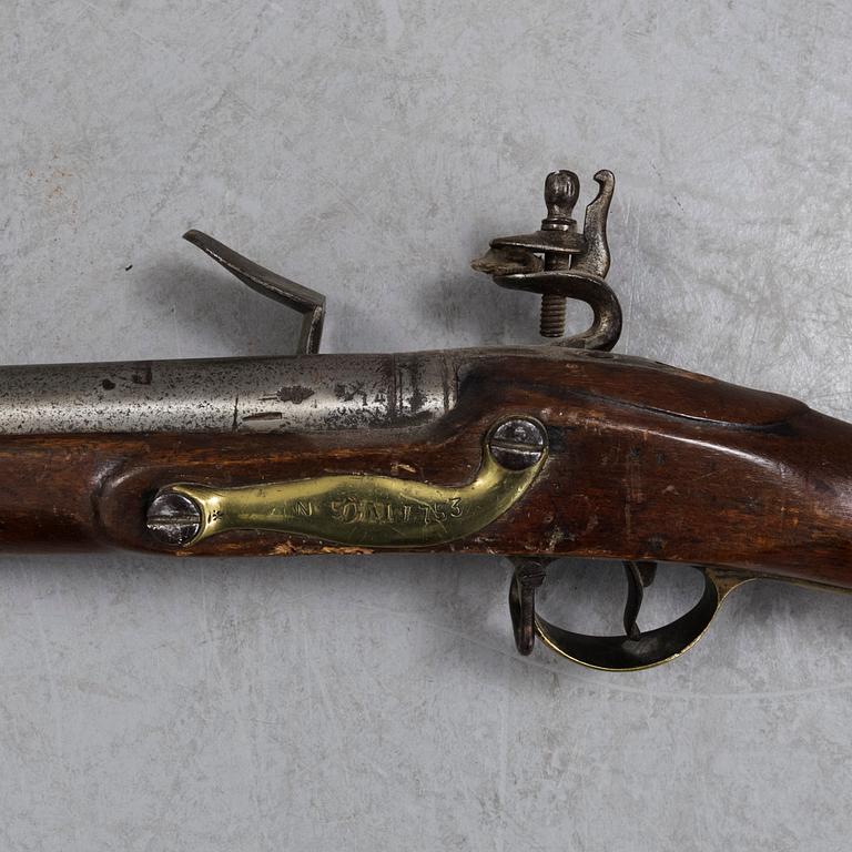 A British military late 18th century flintlock musket.