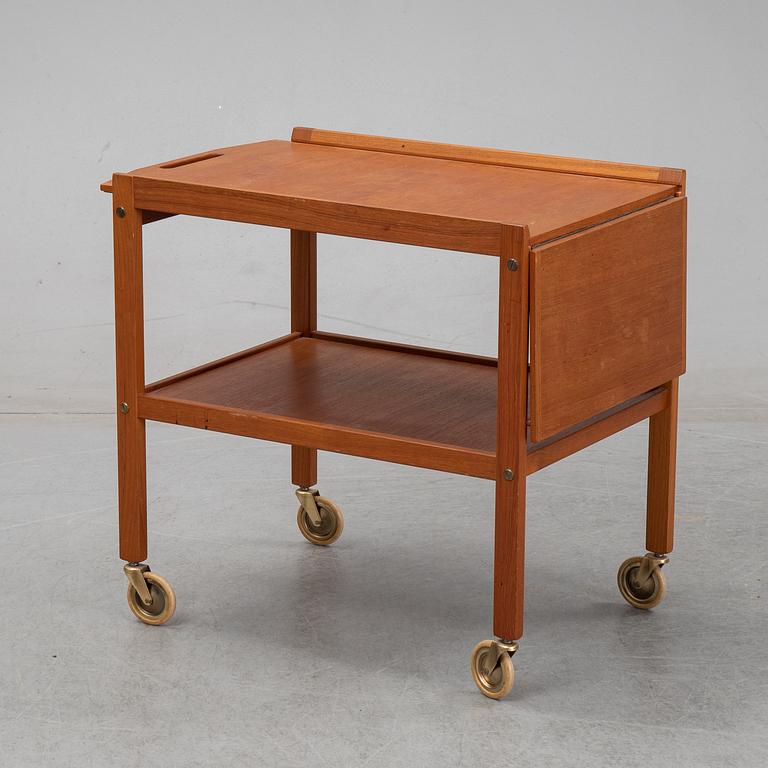 a mid 20th century teak serving trolley.