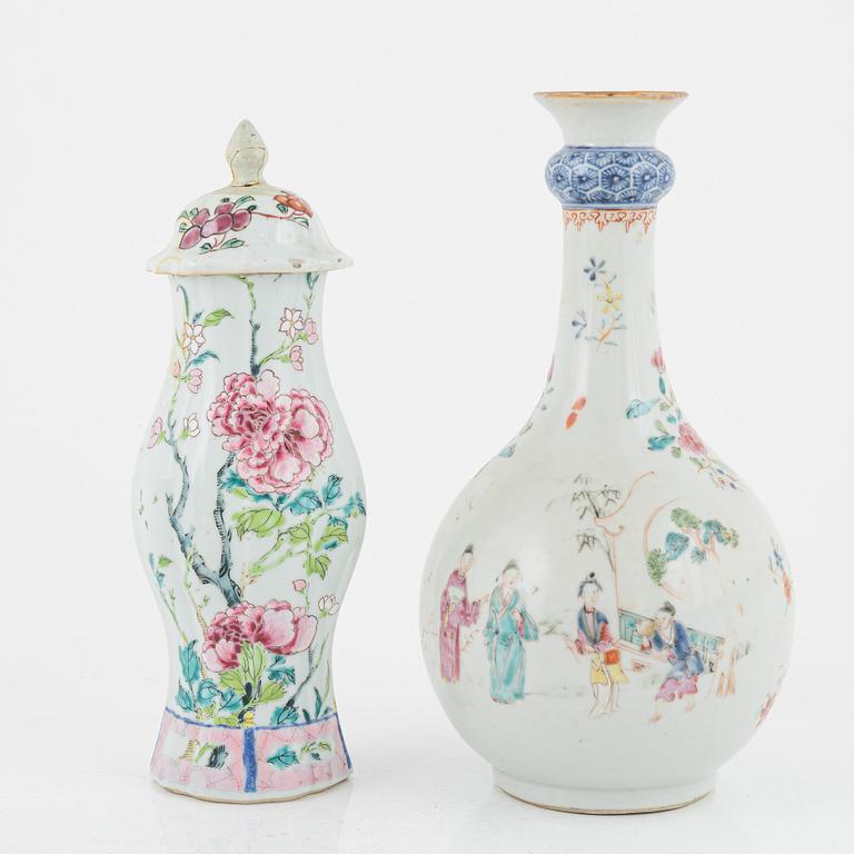 A set of three famille rose vases with covers and a bottle, Qing dynasty, Qianlong (1736-95).