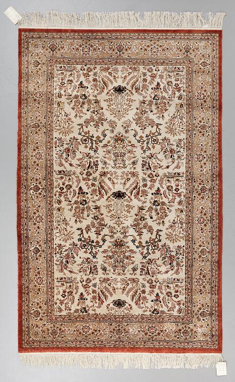 A chinese slik carpet, around 254 x 154 cm.