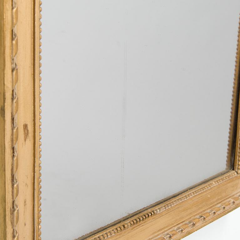 A late Gustavian style mirror, second half of the 19th century.