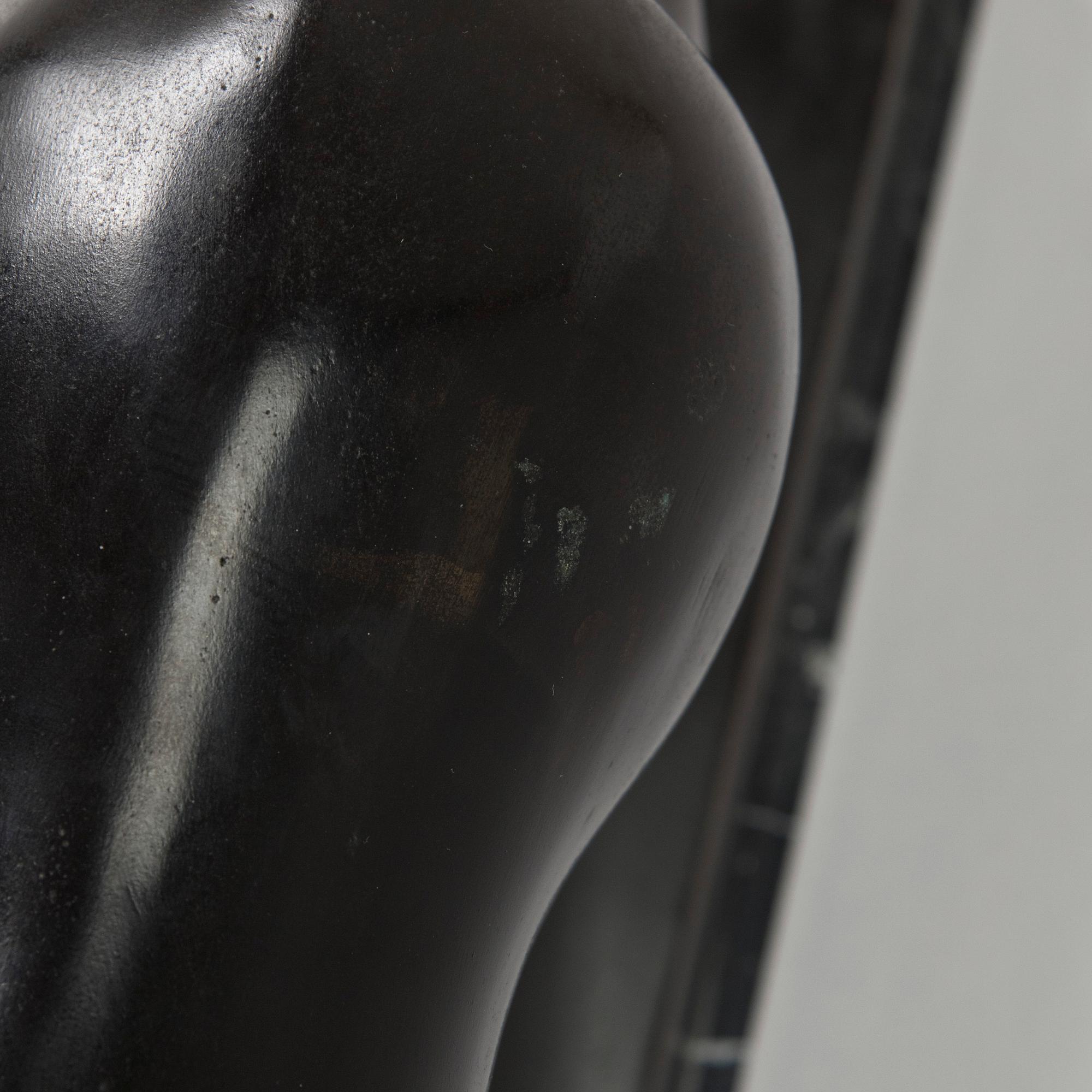 an art Deco style sculpture, bronze and marble.
