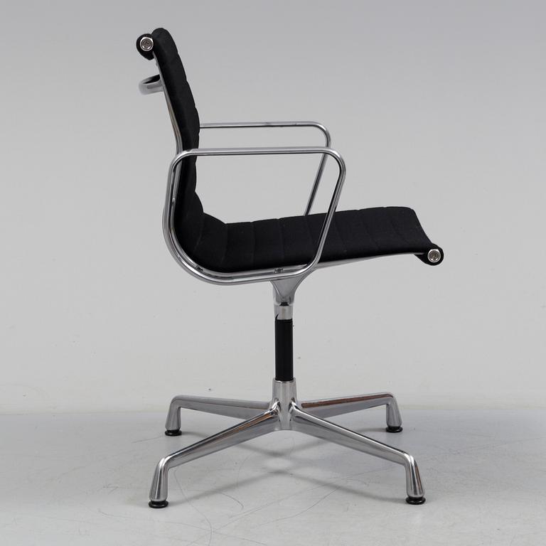 A 'EA 104 Swivel' armchair by Charles & Ray Eames, Vitra, 2016.
