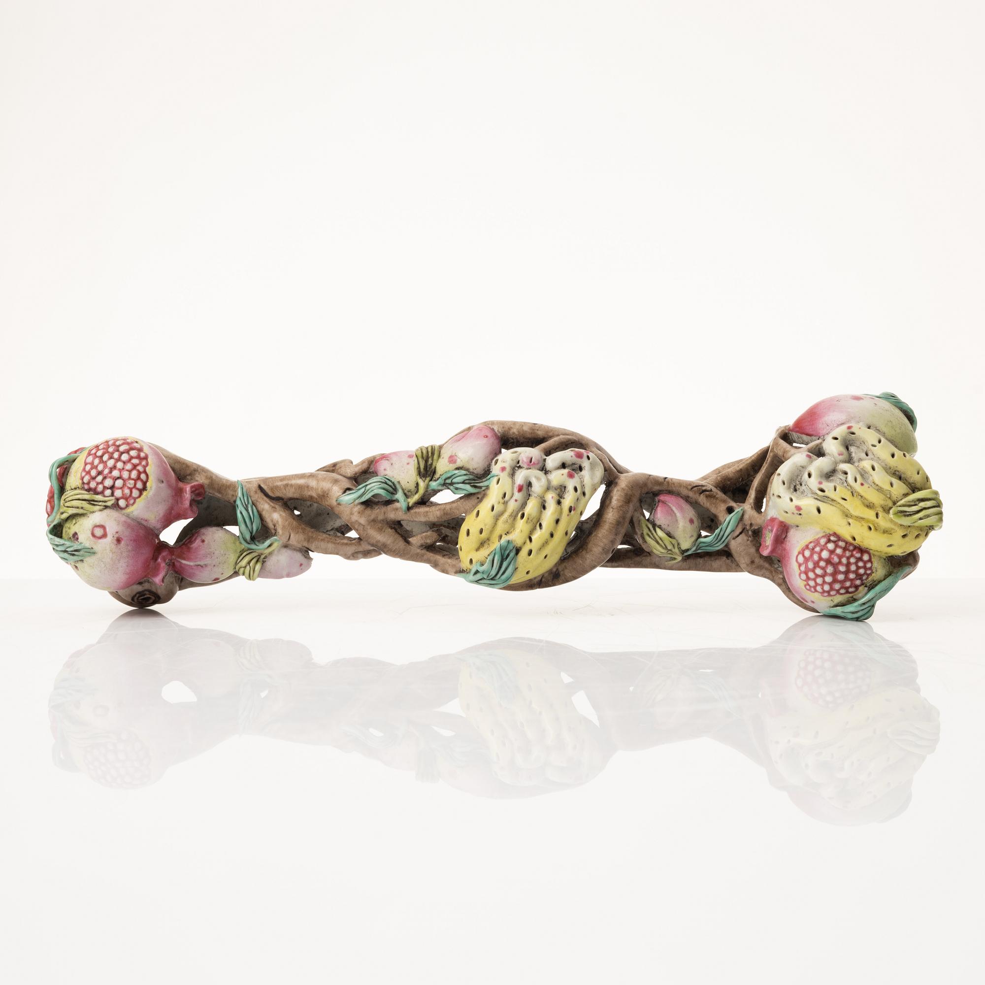 A Chinese porcelain ruyi-sceptre, late 20th century.
