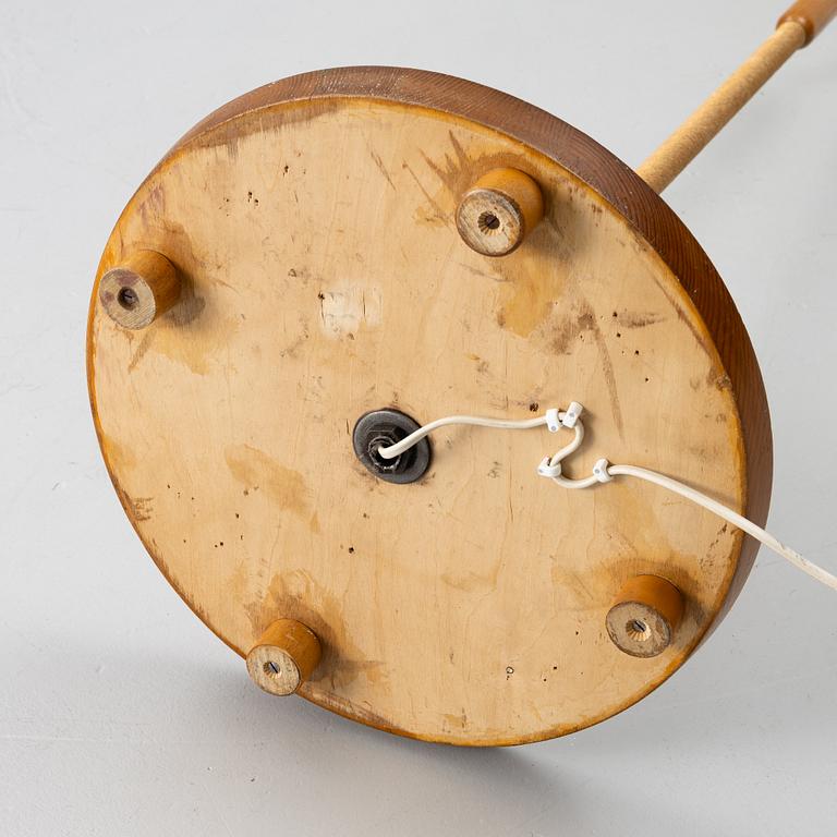 A 1940s Swedish Modern floor lamp.