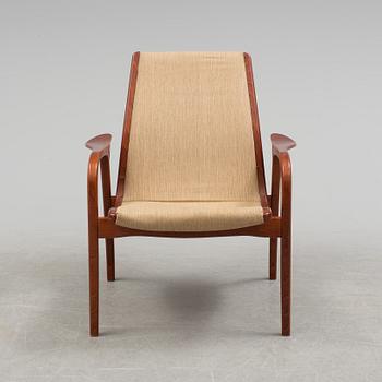 YNGVE EKSTRÖM, a "Kurva" armchair by Swedese.