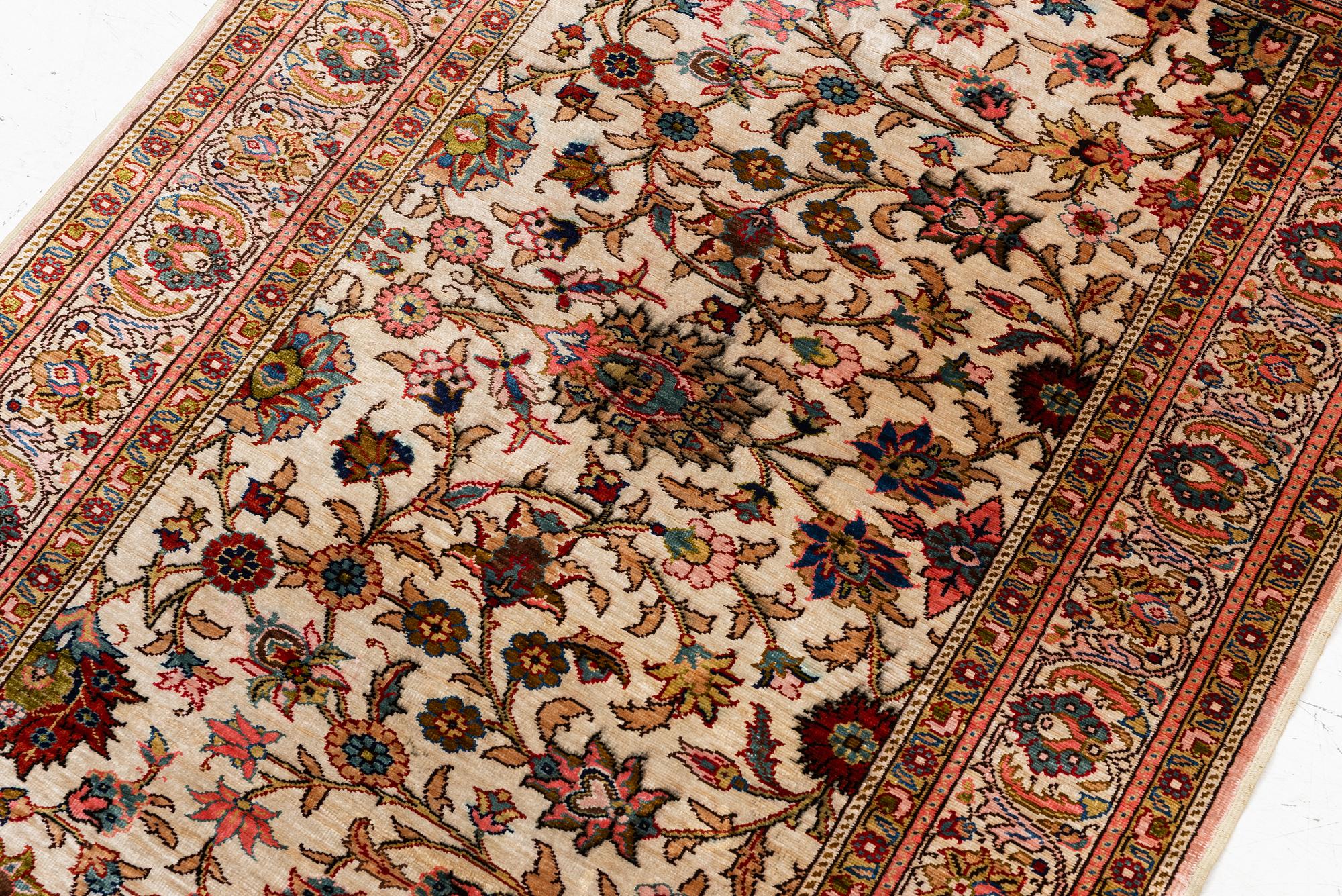 An Oriental silk rug, c. 122 x 76 cm.