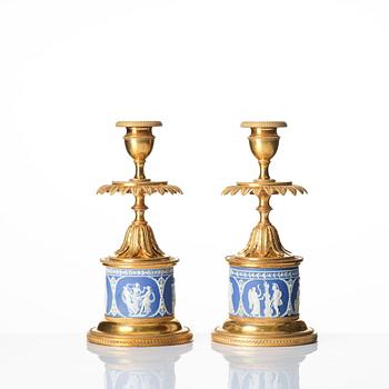 A pair of George III ormolu and jasperware candlesticks, late 18th century.